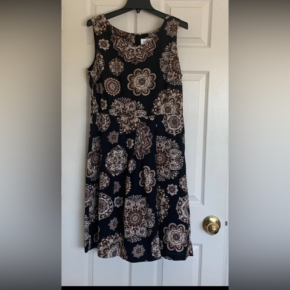 Women’s Dress size 14 for every occasion. Colors black brown beige